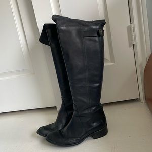 Selling well loved over the knee flat leather boots, Italian made